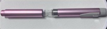 Pen with the cap being pulled off